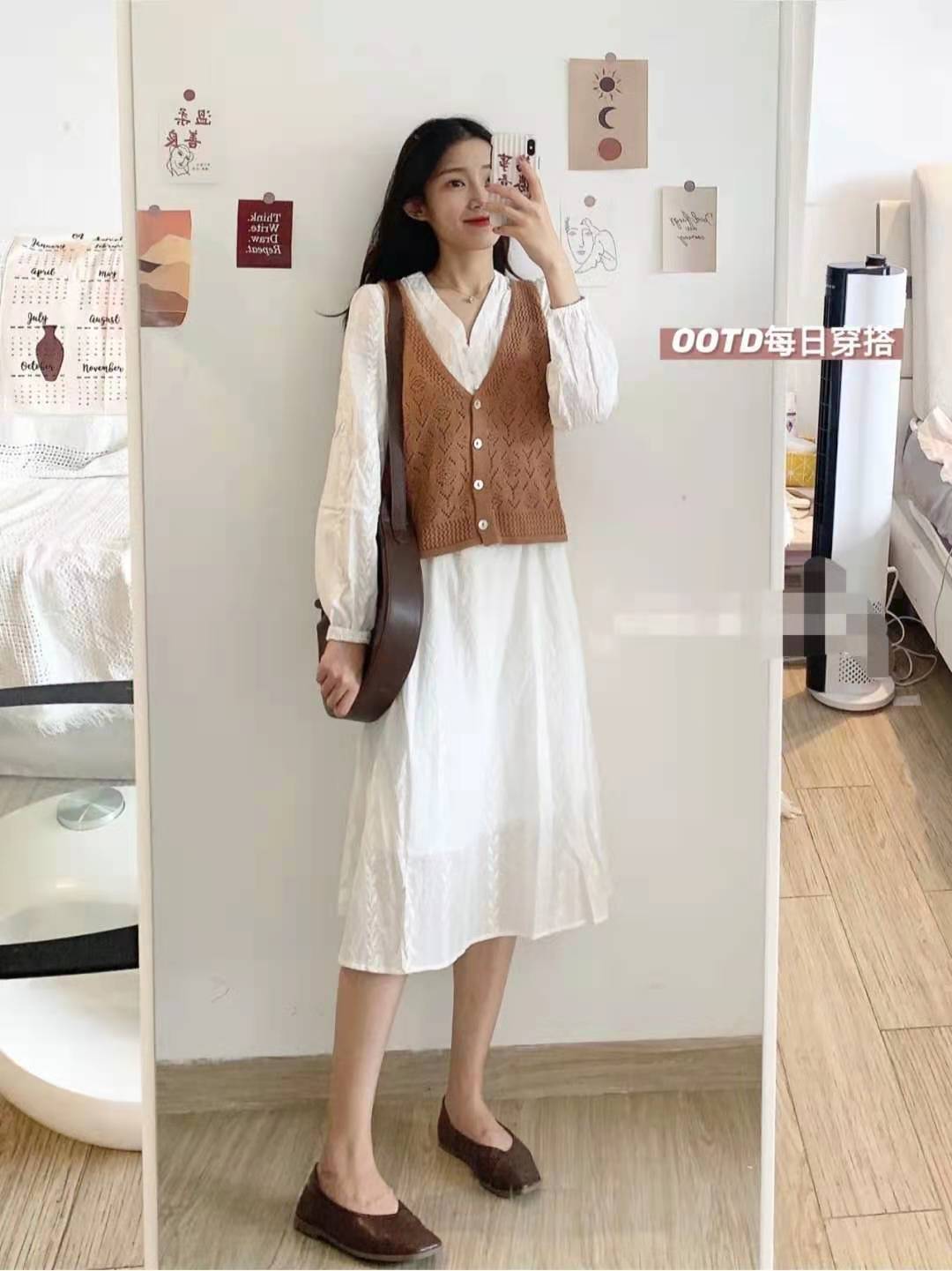 What kind of skirt looks good with a knitted vest iMedia