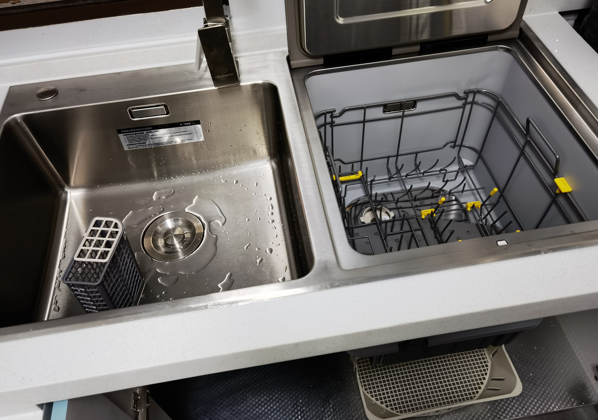 Sink dishwashers are expensive and small in capacity. Why are so many