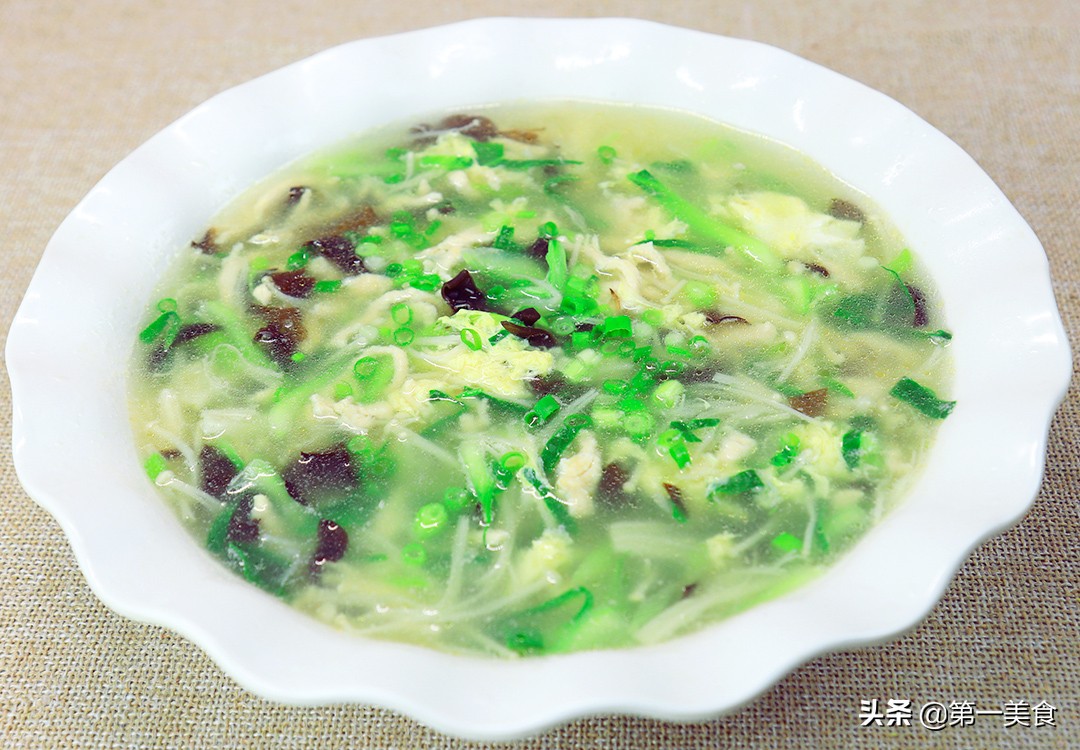 A handful of enoki mushrooms, a piece of chicken breast, the chef