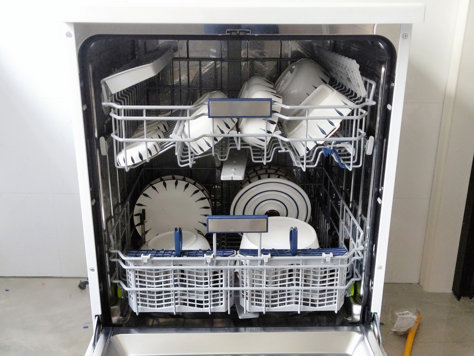 Sink dishwashers are expensive and small in capacity. Why are so many