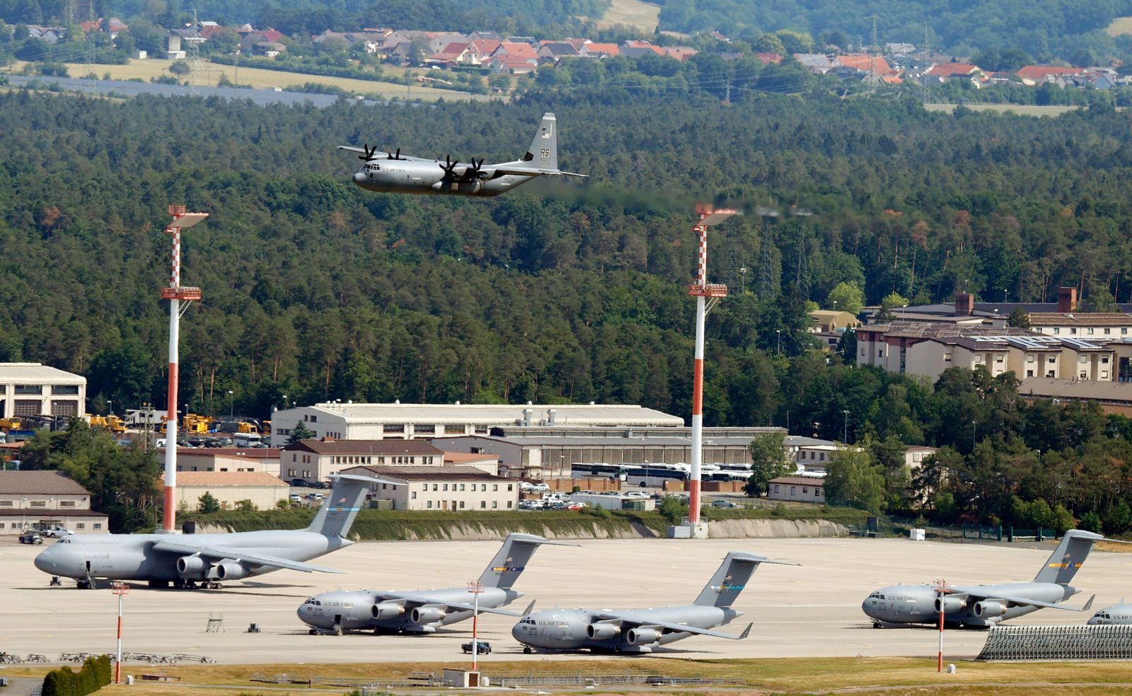 Why did Poland choose the German Ramstein Air Base to transfer the MiG